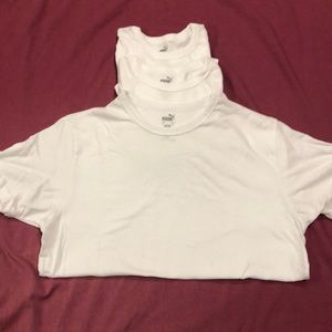 3 white Puma undershirts